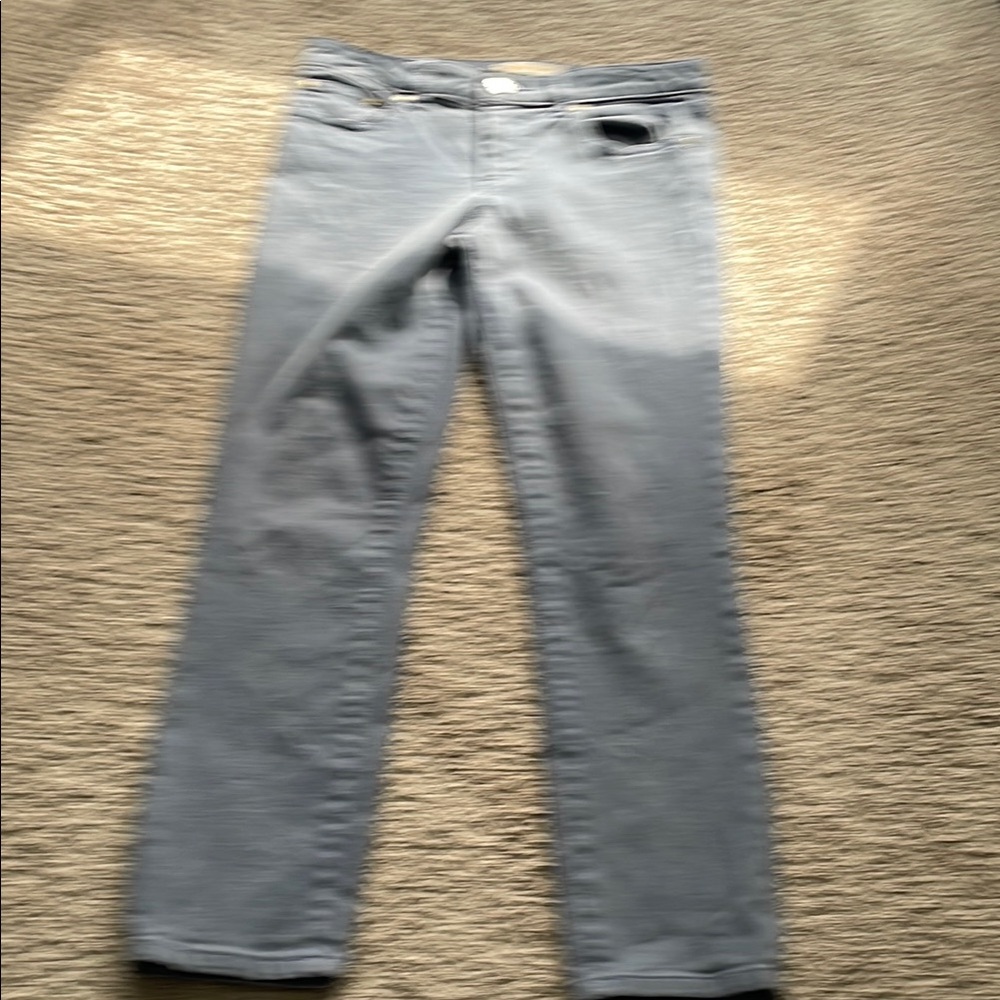 Light blue jeans by Tory Burch